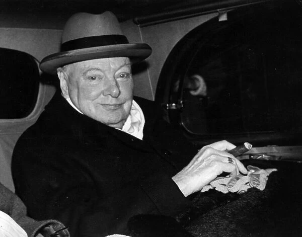 Winston Churchill leaves his home in Hyde Park gate, Londonfor Chartwell where he weill