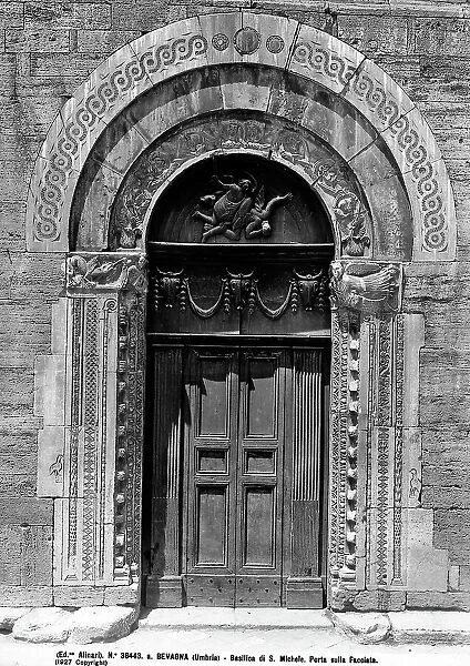 The portal of St. Michael's church by the Masters Binello and Ridolfo, located in Bevagna, province of Perugia