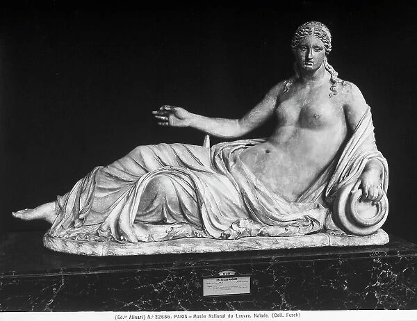 Statue of Naiad on display at the Louvre Museum, Paris