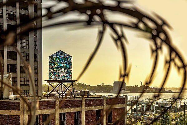 NYC, Brooklyn, Dumbo, Watertower by Tom Fruin Studio, new sculptural artwork. A water tower sculpture in colorful salvaged Plexiglas and steel