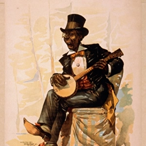 African American in tuxedo and top hat, seated, playing banj