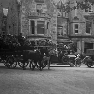 Cars and a carriage at the Tarbet Hotel, Scotland