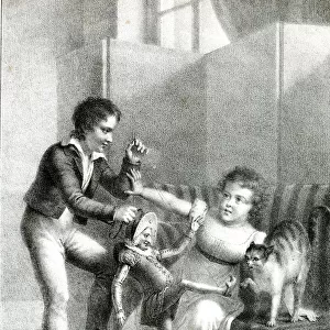Children and cat playing with Mr Punch puppet