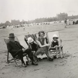 Family group at seaside, 1920s