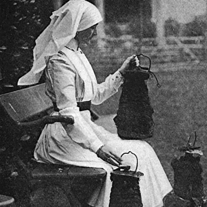 Lady Stradbroke posed with bombs dropped on Henham Hall, WW1