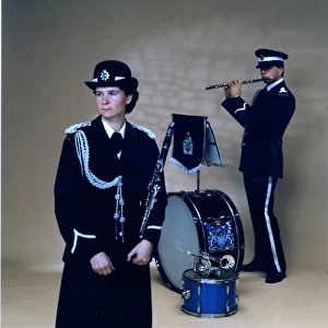 Male and female police band members, London