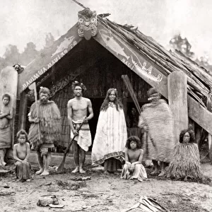 Maori group outside house, New Zealand, c. 1880 s