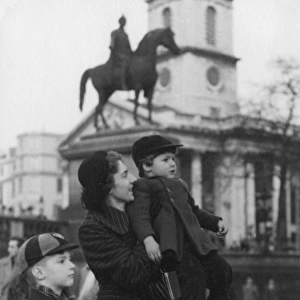 Mother and her two boys in Trafalgar Square, London - 1950s