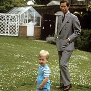 Prince Charles and William in a garden