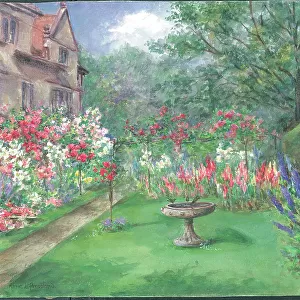 Roses & Lillies'. Garden with lawn, flower borders and house