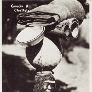 South African woman carrying goods on her head