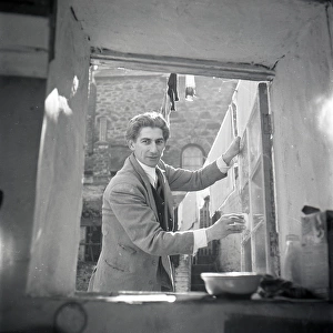 Unknown man at a window