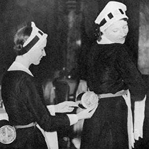 Waitresses wearing gas masks, WWII