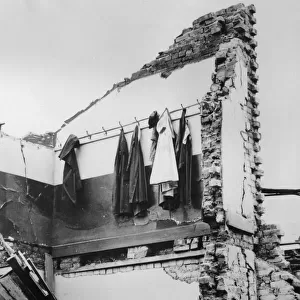 WW2 - Bomb Damage in London - Coats and Hats left on hooks