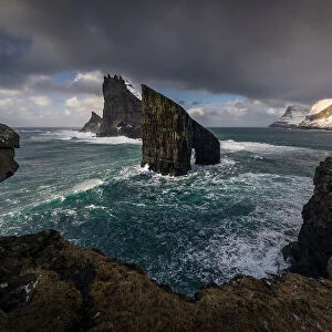 The Arch of Drangarnir in the middle of Atlantic Ocean, the epic landscape of Faroe Islands, Denmark, Atlantic, Europe