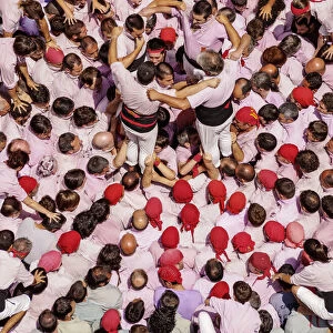 Castell human tower in front of the City Hall during the Festa Major Festival