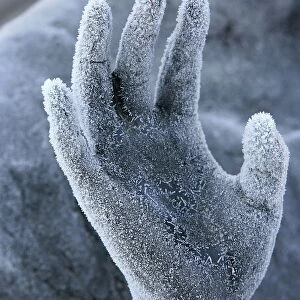 Close-up of frozen hand on sculpture, Milano monumental cemetery, Milan, Lombardy, Italy