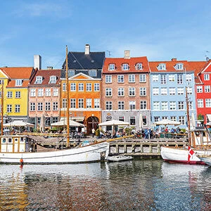 Colorful houses and moored boats in Nyhavn harbour, daytime, Copenhagen, Denmark, Scandinavia, Europe