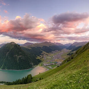 Livigno and lake at sunset, Livigno Valley, Valtellina, Lombardy, Italy, Europe