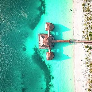 Luxury resort on white coral beach in the clear turquoise water, overhead view, Kendwa, Zanzibar, Tanzania, East Africa, Africa