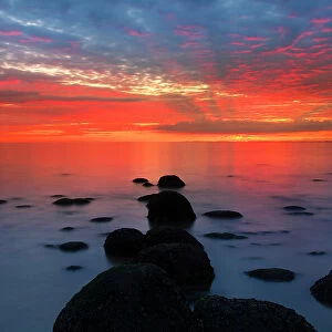 Midsummer sunset over The Wash, from Hunstanton beach, North Norfolk, England, United Kingdom, Europe