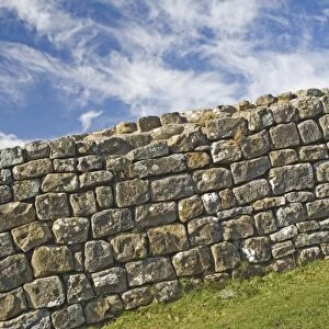A portion of original Hadrians Wall, chisel marks visible on some stones
