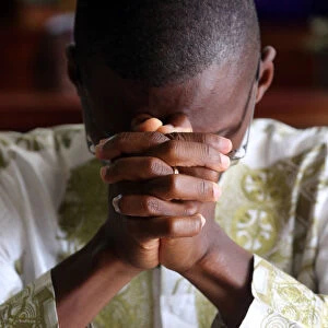 Prayer, Sunday morning Catholic Mass, Lome, Togo, West Africa, Africa