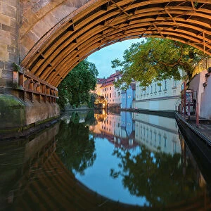 Reflections in Devil's Channel (Certovka) under Charles Bridge, Prague, Bohemia, Czech Republic (Czechia), Europe