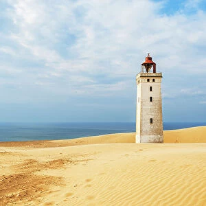 Rubjerg Knude lighthouse surrounded by sand dunes, Jutland, Denmark, Europe