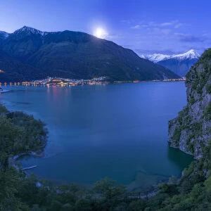 San Fedelino Bay from above illuminated by moon at twilight, Lago di Novate, Valchiavenna, Valtellina, Lombardy, Italy, Europe