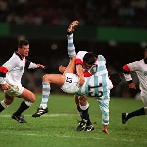 Rory Underwood puts in a big tackle at the 1995 Rugby World Cup