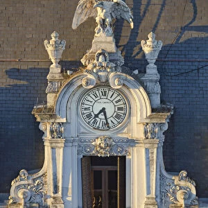 Detail of the clock of "La Prensa"building (Beaux Arts) at sunset on Avenida de Mayo, Monserrat, Buenos Aires, Argentina. Once the headquarters of the "La Prensa"Daily Newspaper
