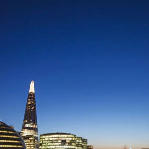 England, London, Southwark, River Thames and London Skyline at Sunset