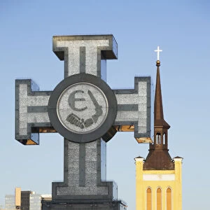 Estonia, Tallinn, Cross In Freedom Square With St Johns Church (Jaani Kirik)