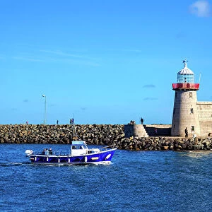 Fishing Boat in front of the Howth Lighthouse, Howth, County Dublin, Ireland