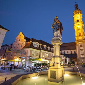 Old Town Water Fountain & Church illuminated at Dusk, Deggendorf, Lower Bavaria