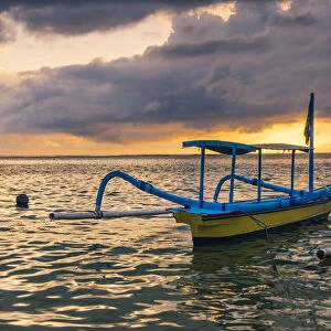 Sanur, Denpasar, Bali, Indonesia. Traditional jukung (fishing boat) at Sanur Beach