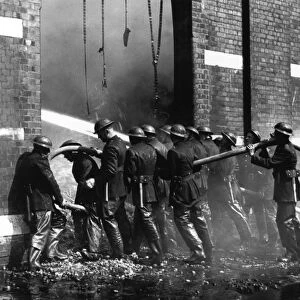 Crew of firefighters in action, WW2