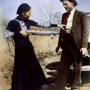 BONNIE AND CLYDE, 1933. American criminal Bonnie Parker (1911-1934) playing at