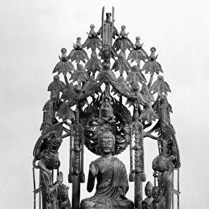 Bronze dedicatory group of Buddha Amitabha surrounded by attendants. Height: 29 1 / 2 in. Chinese, Sui Dynasty, 593 A. D