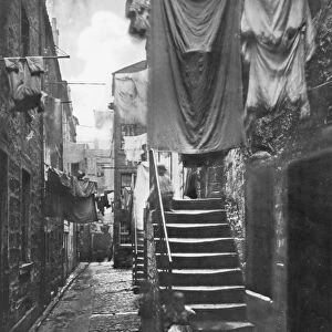 GLASGOW, SCOTLAND. A close (alley) off High Street; photographed in 1868 by Thomas