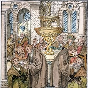 MARTIN LUTHER & JAN HUS giving communion: woodcut by Lucas Cranach (1472-1553)