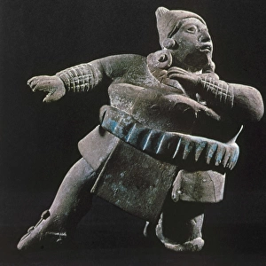 MAYAN ATHLETE, 700-900 A. D. Ceramic figure of a Mayan ball player wearing a thick protective belt, gauntlets and leggings. From Jaina, Campeche, Mexico, 700-900 A. D. Height: 12. 8 cm