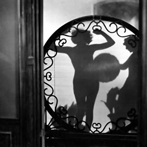 NUDE SHADOW, 1920s. The shadow of actress Clara Bow in the nude. Photographed in the 1920s
