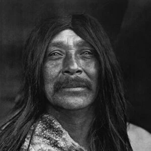 QUILCENE MAN, 1912. Lelehalt, a Quilcene Native American man from northwestern Washington State
