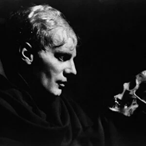 SHAKESPEARE: HAMLET. The German actor Gustaf Gr├╝ndgens in the title role contemplating Yoricks skull, c1938