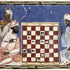 SPAIN: CHESS, c1283. Muslims playing chess in Spain. Manuscript illumination, c1283
