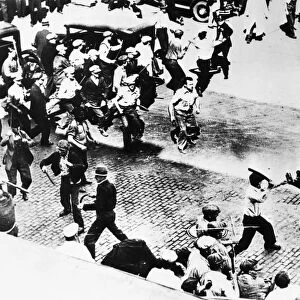 Truck drivers attacking the Minneapolis police during the Teamsters Strike of May 1934