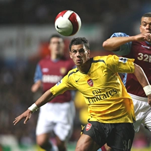 Aliadiere Outshines Bouma: Arsenal's Victory Over Aston Villa in the Barclays Premiership