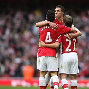 Andrey Arshavin celebrates scoring Arsenals 3rd goal